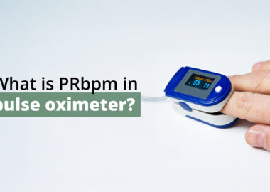 a pulse oximeter on a person's finger with the screen displaying oxygen saturation (SpO2) and PRbpm (pulse rate in beats per minute). The text reads "What is PRbpm in pulse oximeter?